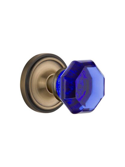 Classic Rosette Door Set with Colored Waldorf Crystal Glass Knobs Cobalt Blue in Antique Brass.